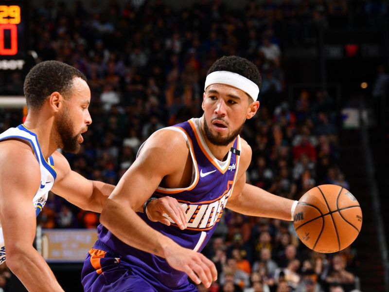 PHOENIX, AZ - NOVEMBER 30: Devin Booker #1 of the Phoenix Suns dribbles the ball during the game against the Golden State Warriors on November 30, 2024 at Footprint Center in Phoenix, Arizona. NOTE TO USER: User expressly acknowledges and agrees that, by downloading and or using this photograph, user is consenting to the terms and conditions of the Getty Images License Agreement. Mandatory Copyright Notice: Copyright 2024 NBAE (Photo by Barry Gossage/NBAE via Getty Images)