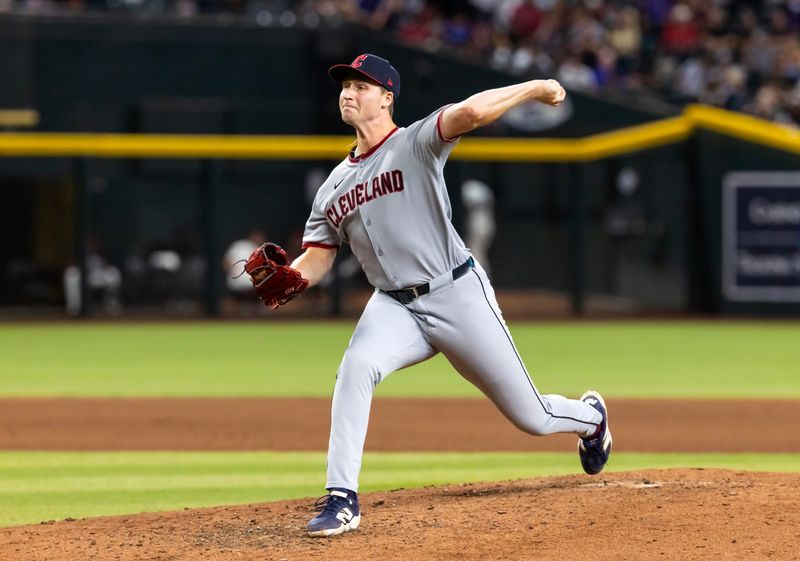 Aug 19, 2025; Phoenix, Arizona, USA; Cleveland Guardians pitcher Tim Herrin against the Arizona Diamondbacks at Chase Field. Mandatory Credit: Mark J. Rebilas-Imagn Images