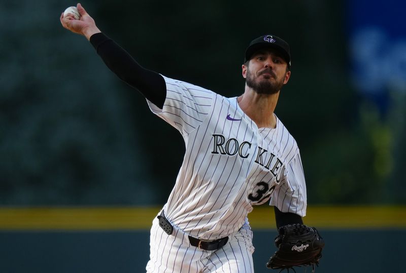 Jul 3, 2024; Denver, Colorado, USA; Colorado Rockies starting pitcher Dakota Hudson (32) delivers a pitch in the first inning against the Milwaukee Brewers at Coors Field. Mandatory Credit: Ron Chenoy-USA TODAY Sports