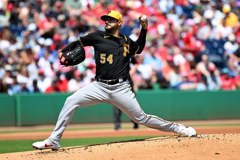 Mar 18, 2024; Clearwater, Florida, USA; Pittsburgh Pirates starting pitcher Martin Perez (54) throws a pitch in the first inning of the spring training game against the Philadelphia Phillies at BayCare Ballpark. Mandatory Credit: Jonathan Dyer-USA TODAY Sports