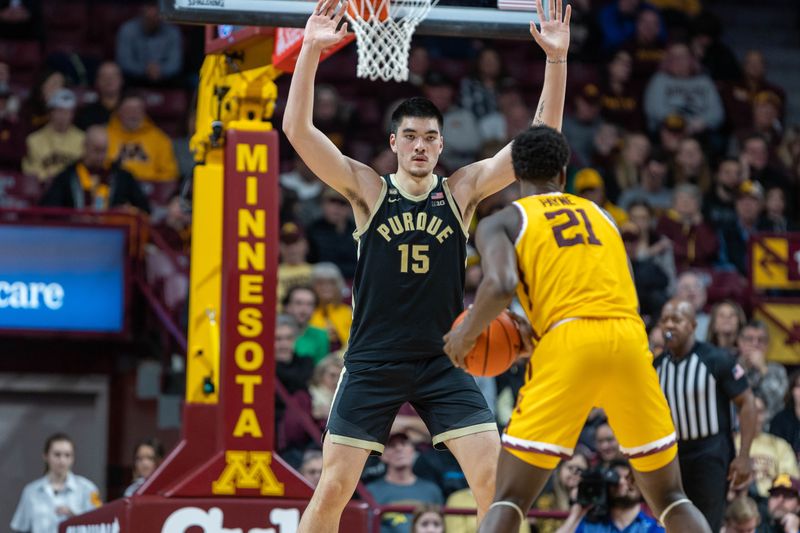 Jan 19, 2023; Minneapolis, Minnesota, USA; Purdue Boilermakers center Zach Edey (15) guards Minnesota Golden Gophers forward Pharrel Payne (21) in the second half at Williams Arena. Mandatory Credit: Matt Blewett-USA TODAY Sports