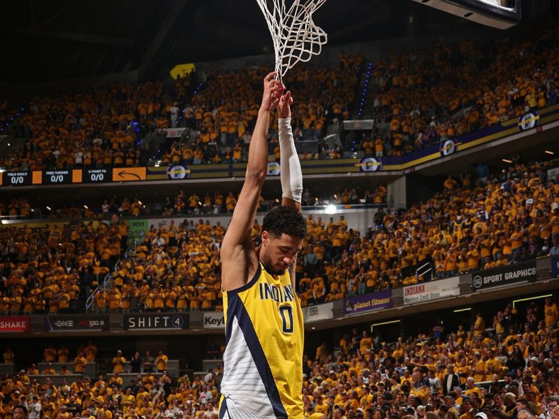 INDIANAPOLIS, IN - MAY 27:  Tyrese Haliburton #0 of the Indiana Pacers looks on during the game against the New York Knicks  during Game 4 of the 2025 Eastern Conference Finals on May 27, 2025 at Gainbridge Fieldhouse in Indianapolis, Indiana. NOTE TO USER: User expressly acknowledges and agrees that, by downloading and or using this Photograph, user is consenting to the terms and conditions of the Getty Images License Agreement. Mandatory Copyright Notice: Copyright 2025 NBAE (Photo by Nathaniel S. Butler/NBAE via Getty Images)