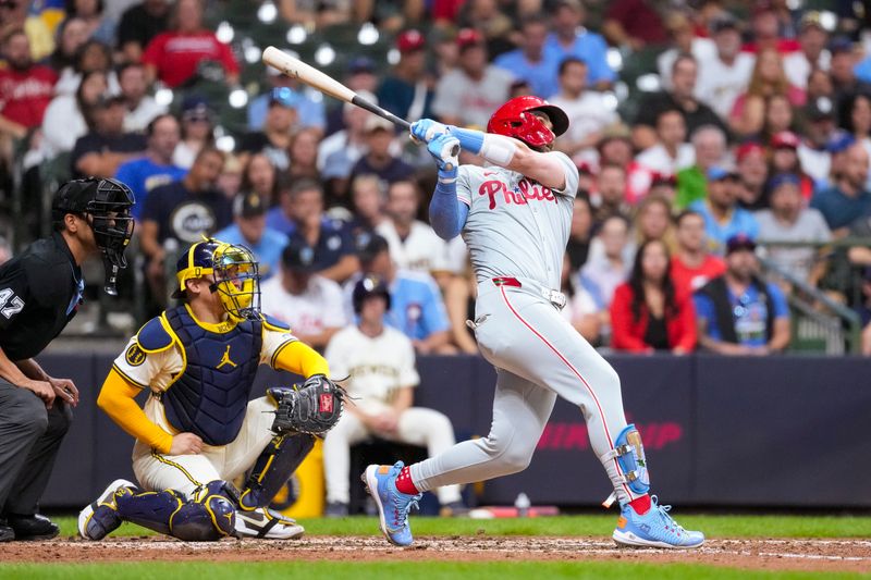 Sep 17, 2024; Milwaukee, Wisconsin, USA;  Philadelphia Phillies first baseman Bryce Harper (3) hits a home run during the sixth inning against the Milwaukee Brewers at American Family Field. Mandatory Credit: Jeff Hanisch-Imagn Images