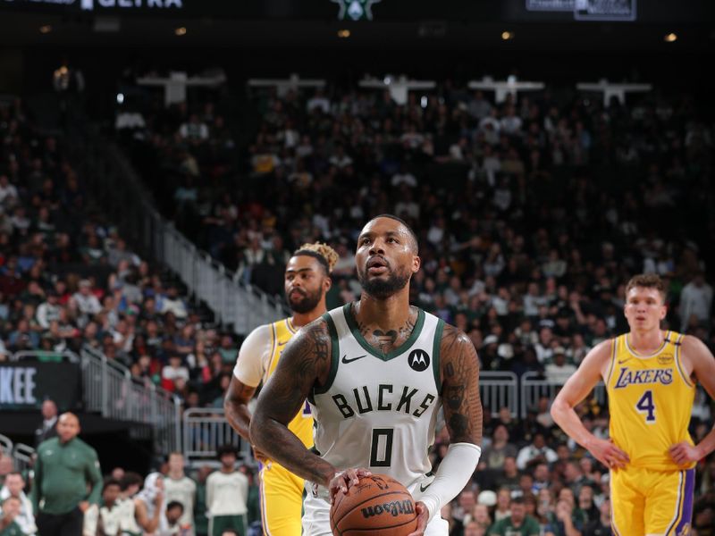 MILWAUKEE, WI - OCTOBER 10: Damian Lillard #0 of the Milwaukee Bucks shoots a free throw during the game against the Los Angeles Lakers during a preseason game on October 10, 2024 at Fiserv Forum Center in Milwaukee, Wisconsin. NOTE TO USER: User expressly acknowledges and agrees that, by downloading and or using this Photograph, user is consenting to the terms and conditions of the Getty Images License Agreement. Mandatory Copyright Notice: Copyright 2024 NBAE (Photo by Gary Dineen/NBAE via Getty Images).