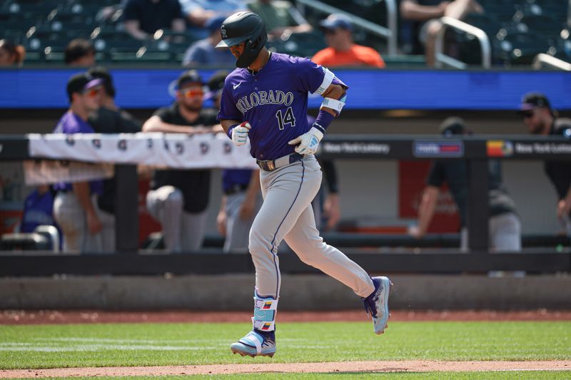 Jul 14, 2024; New York City, New York, USA; Colorado Rockies shortstop Ezequiel Tovar (14) runs the bases after his two run home run during the seventh inning against the New York Mets at Citi Field. Mandatory Credit: Vincent Carchietta-USA TODAY Sports