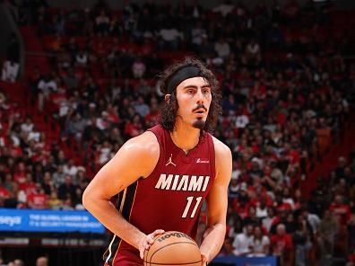 MIAMI, FL - DECEMBER 25:  Jaime Jaquez Jr. #11 of the Miami Heat shoots a free throw during the game against the Philadelphia 76ers on December 25, 2023 at Kaseya Center in Miami, Florida. NOTE TO USER: User expressly acknowledges and agrees that, by downloading and or using this Photograph, user is consenting to the terms and conditions of the Getty Images License Agreement. Mandatory Copyright Notice: Copyright 2023 NBAE (Photo by David Sherman/NBAE via Getty Images)