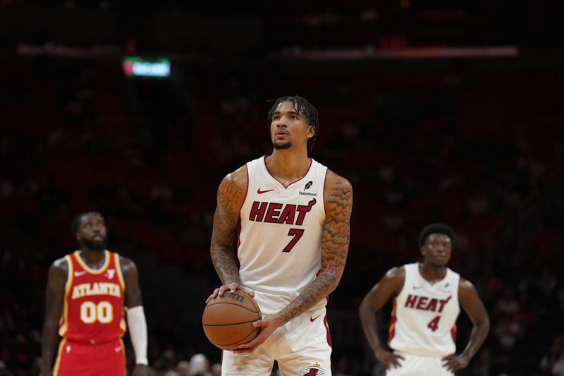 MIAMI, FL - OCTOBER 16: Kel'el Ware #7 of the Miami Heat prepares to shoot a free throw during the game against the Atlanta Hawks during a preseason game on October 16, 2024 at Kaseya Center in Miami, Florida. NOTE TO USER: User expressly acknowledges and agrees that, by downloading and or using this Photograph, user is consenting to the terms and conditions of the Getty Images License Agreement. Mandatory Copyright Notice: Copyright 2024 NBAE (Photo by Eric Espada/NBAE via Getty Images)