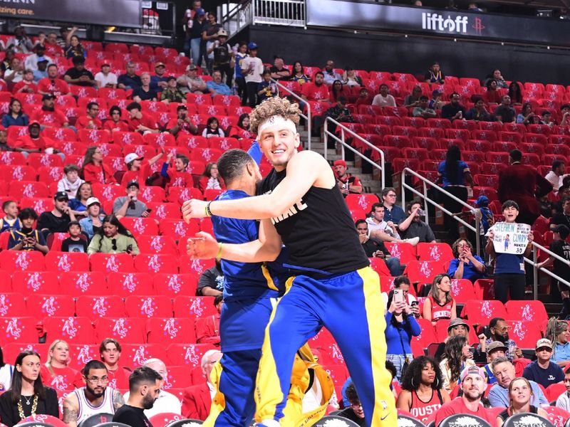 HOUSTON, TX - APRIL 4: Brandin Podziemski #2 and Stephen Curry #30 of the Golden State Warriors warm up before the game against the Houston Rockets on April 4, 2024 at the Toyota Center in Houston, Texas. NOTE TO USER: User expressly acknowledges and agrees that, by downloading and or using this photograph, User is consenting to the terms and conditions of the Getty Images License Agreement. Mandatory Copyright Notice: Copyright 2024 NBAE (Photo by Logan Riely/NBAE via Getty Images)