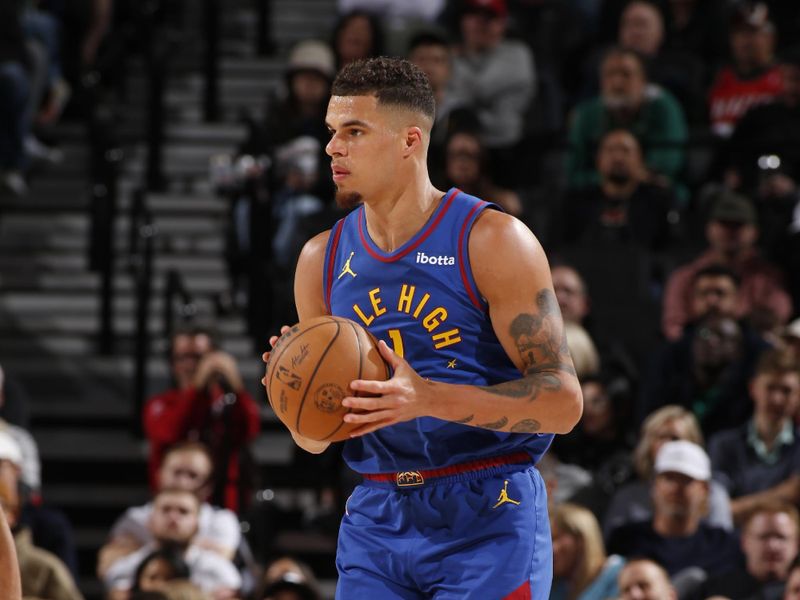 PORTLAND, OR - FEBRUARY 23: Michael Porter Jr. #1 of the Denver Nuggets handles the ball during the game against the Portland Trail Blazers on February 23, 2024 at the Moda Center Arena in Portland, Oregon. NOTE TO USER: User expressly acknowledges and agrees that, by downloading and or using this photograph, user is consenting to the terms and conditions of the Getty Images License Agreement. Mandatory Copyright Notice: Copyright 2024 NBAE (Photo by Cameron Browne/NBAE via Getty Images)