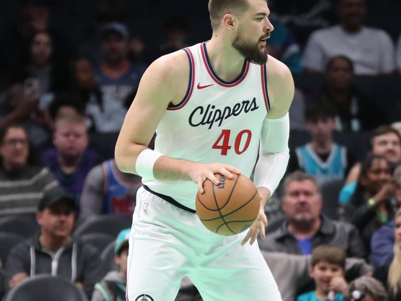 CHARLOTTE, NC - JANUARY 31: Ivica Zubac #40 of the LA Clippers handles the ball during the game against the Charlotte Hornets on January 31, 2025 at Spectrum Center in Charlotte, North Carolina. NOTE TO USER: User expressly acknowledges and agrees that, by downloading and or using this photograph, User is consenting to the terms and conditions of the Getty Images License Agreement. Mandatory Copyright Notice: Copyright 2024 NBAE (Photo by Brock Williams-Smith/NBAE via Getty Images)