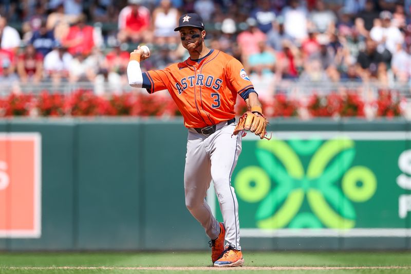 Jul 6, 2024; Minneapolis, Minnesota, USA; Houston Astros shortstop Jeremy Pena (3) throws to first base to get out Minnesota Twins shortstop Carlos Correa (4) during the sixth inning at Target Field. Mandatory Credit: Matt Krohn-USA TODAY Sports