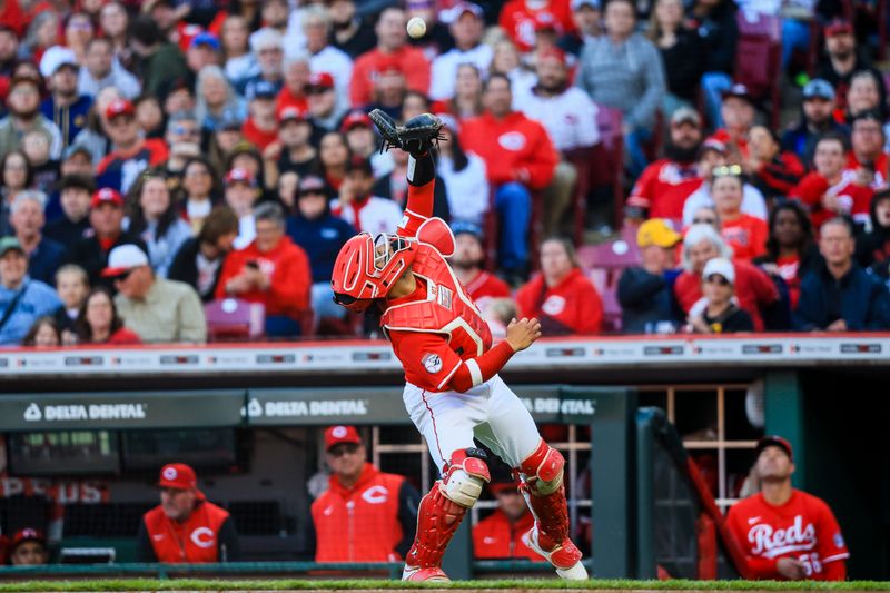 Apr 12, 2025; Cincinnati, Ohio, USA; Cincinnati Reds catcher Jose Trevino (35) catches a pop up hit by Pittsburgh Pirates catcher Henry Davis (not pictured) in the third inning at Great American Ball Park. Mandatory Credit: Katie Stratman-Imagn Images