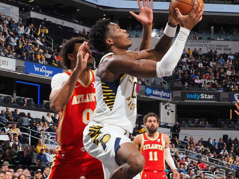 INDIANAPOLIS, IN - FEBRUARY 1: Bennedict Mathurin #00 of the Indiana Pacers drives to the basket during the game against the Atlanta Hawks on February 1, 2025 at Gainbridge Fieldhouse in Indianapolis, Indiana. NOTE TO USER: User expressly acknowledges and agrees that, by downloading and or using this Photograph, user is consenting to the terms and conditions of the Getty Images License Agreement. Mandatory Copyright Notice: Copyright 2025 NBAE (Photo by Ron Hoskins/NBAE via Getty Images)