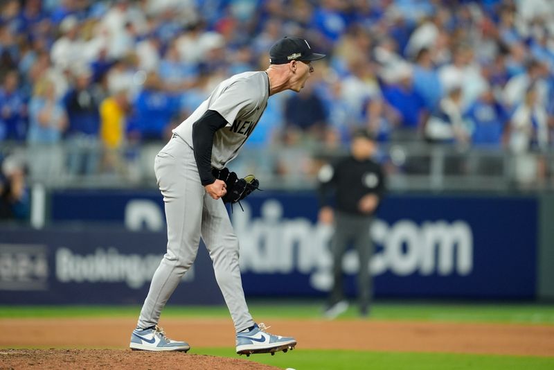 Oct 10, 2024; Kansas City, Missouri, USA; New York Yankees pitcher Luke Weaver (30) celebrates a win over the Kansas City Royals during game four of the ALDS for the 2024 MLB Playoffs at Kauffman Stadium. Mandatory Credit: Jay Biggerstaff-Imagn Images