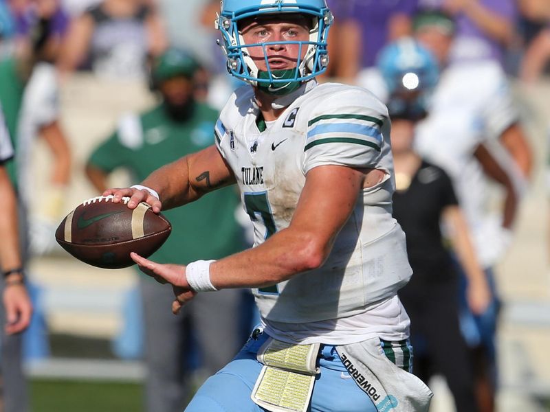 Sep 17, 2022; Manhattan, Kansas, USA; Tulane Green Wave quarterback Michael Pratt (7) drops back to pass during the fourth quarter against the Kansas State Wildcats at Bill Snyder Family Football Stadium. Mandatory Credit: Scott Sewell-USA TODAY Sports