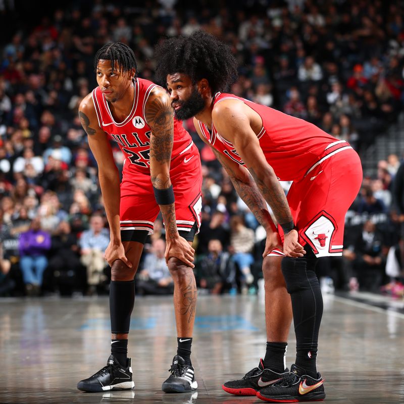 BROOKLYN, NY - MARCH 29: Dalen Terry #25 and Coby White #0 of the Chicago Bulls look on during the game against the Brooklyn Nets on March 29, 2024 at Barclays Center in Brooklyn, New York. NOTE TO USER: User expressly acknowledges and agrees that, by downloading and or using this Photograph, user is consenting to the terms and conditions of the Getty Images License Agreement. Mandatory Copyright Notice: Copyright 2024 NBAE (Photo by David L. Nemec/NBAE via Getty Images)