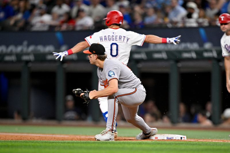 Jun 30, 2025; Arlington, Texas, USA; Baltimore Orioles first baseman Coby Mayo (16) puts out Texas Rangers center fielder Sam Haggerty (0) during the third inning at Globe Life Field. Mandatory Credit: Jerome Miron-Imagn Images