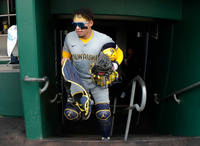 Apr 25, 2024; Pittsburgh, Pennsylvania, USA;  Milwaukee Brewers catcher William Contreras (24) enters the dugout to play the Pittsburgh Pirates at PNC Park. Mandatory Credit: Charles LeClaire-USA TODAY Sports