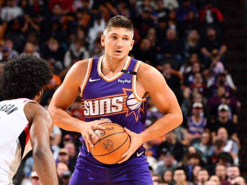 PHOENIX, AZ - NOVEMBER 2: Grayson Allen #8 of the Phoenix Suns looks to pass the ball during the game against the Portland Trail Blazers on November 2, 2024 at Footprint Center in Phoenix, Arizona. NOTE TO USER: User expressly acknowledges and agrees that, by downloading and or using this photograph, user is consenting to the terms and conditions of the Getty Images License Agreement. Mandatory Copyright Notice: Copyright 2024 NBAE (Photo by Barry Gossage/NBAE via Getty Images)