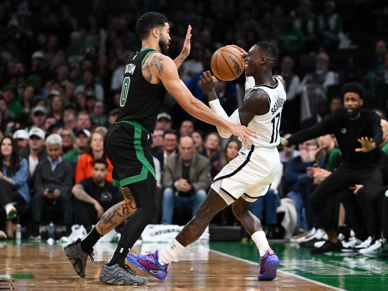 BOSTON, MASSACHUSETTS - NOVEMBER 08: Jayson Tatum #0 of the Boston Celtics defends Dennis Schroder #17 of the Brooklyn Nets during the second quarter at the TD Garden on November 08, 2024 in Boston, Massachusetts. NOTE TO USER: User expressly acknowledges and agrees that, by downloading and or using this photograph, User is consenting to the terms and conditions of the Getty Images License Agreement. (Photo by Brian Fluharty/Getty Images)