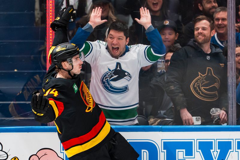 Jan 23, 2026; Vancouver, British Columbia, CAN; Vancouver Canucks forward Linus Karlsson (94) celebrates his goal against the New Jersey Devils in the second period at Rogers Arena. Mandatory Credit: Bob Frid-Imagn Images