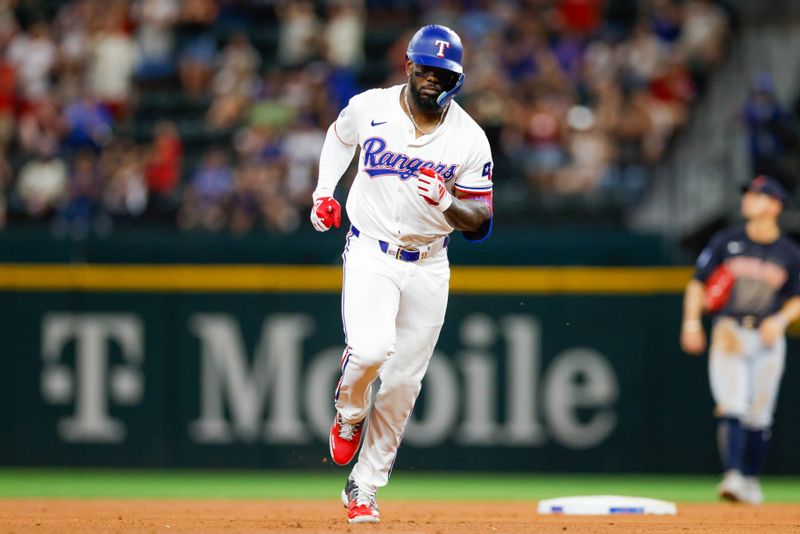 May 15, 2024; Arlington, Texas, USA; Texas Rangers outfielder Adolis García (53) hits a two-run home run during the sixth inning against the Cleveland Guardians at Globe Life Field. Mandatory Credit: Andrew Dieb-USA TODAY Sports