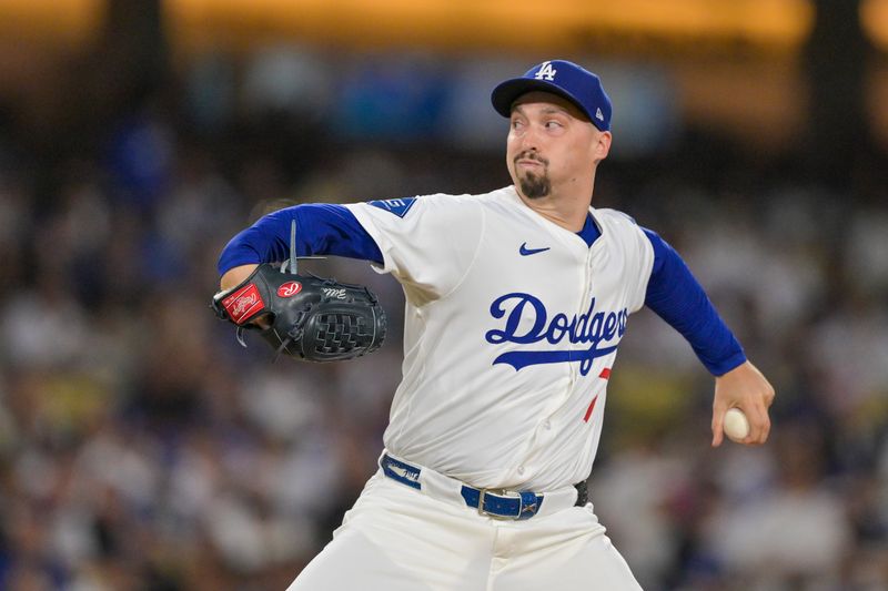 Sep 10, 2025; Los Angeles, California, USA; Los Angeles Dodgers starting pitcher Blake Snell (7) throws a pitch against Colorado Rockies in the first inning at Dodger Stadium. Mandatory Credit: Jayne Kamin-Oncea-Imagn Images