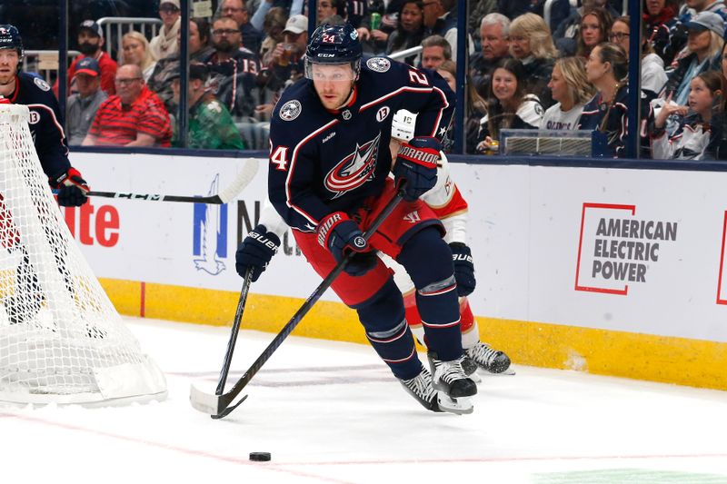 Oct 15, 2024; Columbus, Ohio, USA; Columbus Blue Jackets center Mathieu Olivier (24) tracks down a loose puck against the Florida Panthers during the first period at Nationwide Arena. Mandatory Credit: Russell LaBounty-Imagn Images