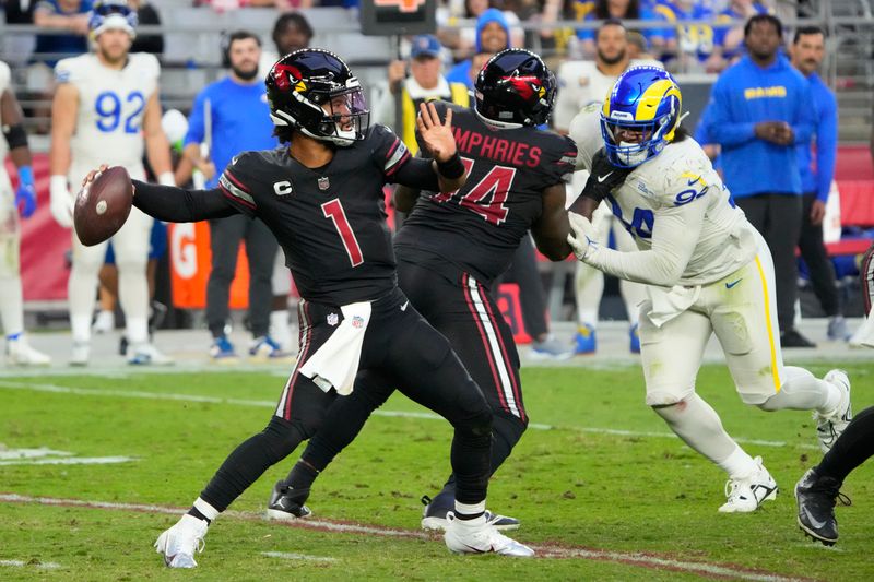 Arizona Cardinals quarterback Kyler Murray (1) throws the ball against the Los Angeles Rams during the first half of an NFL football game, Sunday, Nov. 26, 2023, in Glendale, Ariz. (AP Photo/Rick Scuteri)