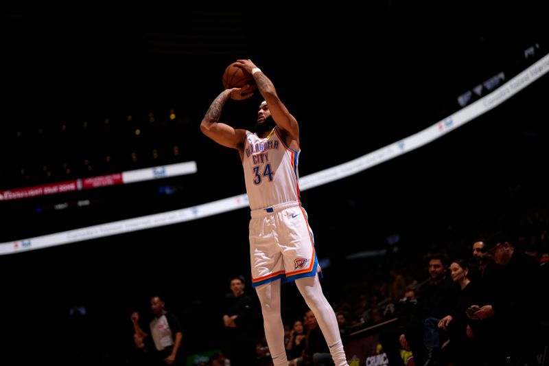 TORONTO, CANADA - MARCH 22:  Kenrich Williams #34 of the Oklahoma City Thunder shoots the ball during the game against the Toronto Raptors on March 22, 2024 at the Scotiabank Arena in Toronto, Ontario, Canada.  NOTE TO USER: User expressly acknowledges and agrees that, by downloading and or using this Photograph, user is consenting to the terms and conditions of the Getty Images License Agreement.  Mandatory Copyright Notice: Copyright 2024 NBAE (Photo by Mark Blinch/NBAE via Getty Images)