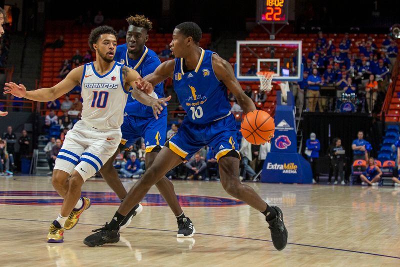 Jan 3, 2023; Boise, Idaho, USA;  San Jose State Spartans guard Omari Moore (10) dribbles the ball during the first half agains the Boise State Broncos at ExtraMile Arena. Mandatory Credit: Brian Losness-USA TODAY Sports