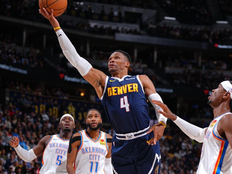 DENVER, CO - NOVEMBER 6: Russell Westbrook #4 of the Denver Nuggets drives to the basket during the game against the Oklahoma City Thunder on November 6, 2024 at Ball Arena in Denver, Colorado. NOTE TO USER: User expressly acknowledges and agrees that, by downloading and/or using this Photograph, user is consenting to the terms and conditions of the Getty Images License Agreement. Mandatory Copyright Notice: Copyright 2024 NBAE (Photo by Garrett Ellwood/NBAE via Getty Images)