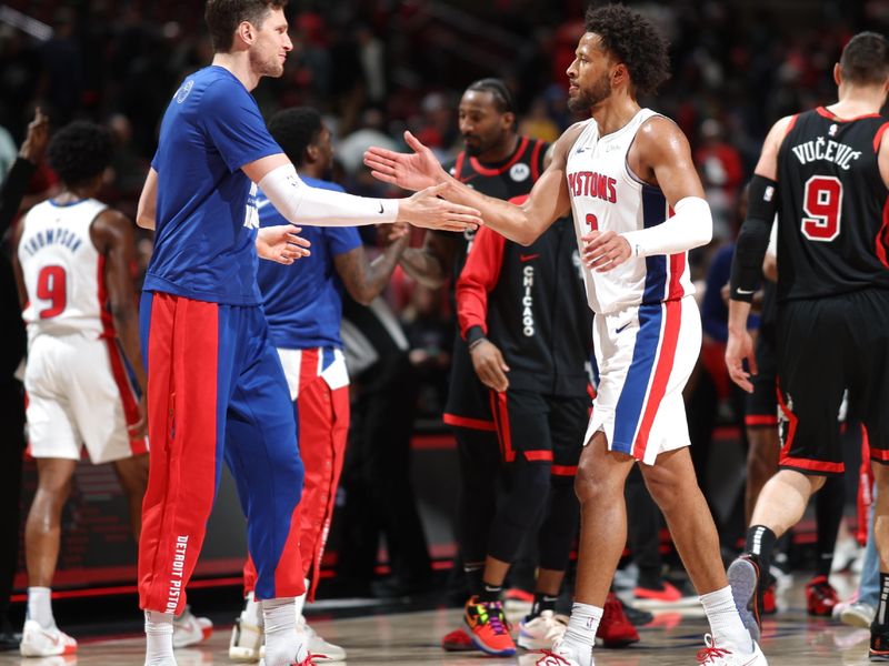 CHICAGO, IL -FEBRUARY 27: Mike Muscala #41 high fives Cade Cunningham #2 of the Detroit Pistons after the game against the Chicago Bulls on February 27, 2024 at United Center in Chicago, Illinois. NOTE TO USER: User expressly acknowledges and agrees that, by downloading and or using this photograph, User is consenting to the terms and conditions of the Getty Images License Agreement. Mandatory Copyright Notice: Copyright 2024 NBAE (Photo by Jeff Haynes/NBAE via Getty Images)