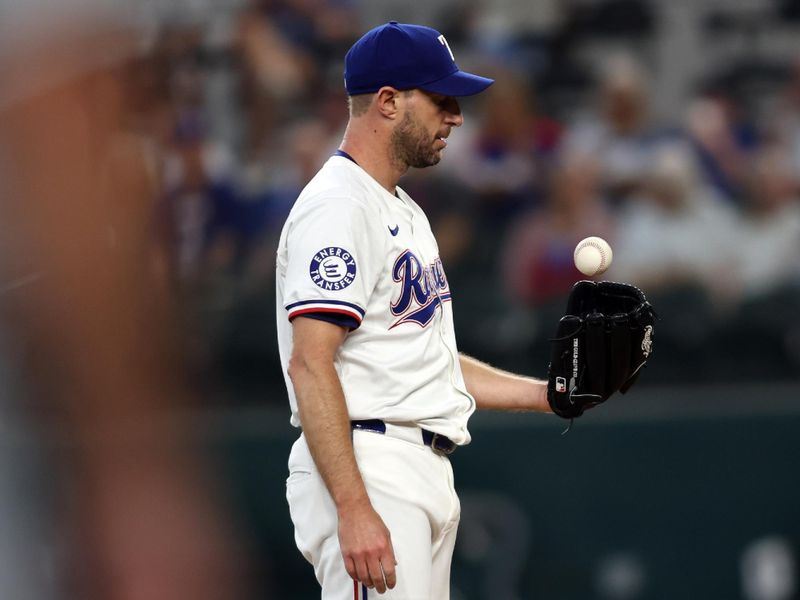 Jul 25, 2024; Arlington, Texas, USA; Texas Rangers pitcher Max Scherzer (31) catches a ball on the mound in the first inning against the Chicago White Sox at Globe Life Field. Mandatory Credit: Tim Heitman-USA TODAY Sports