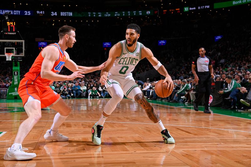 BOSTON, MA - APRIL 3: Jayson Tatum #0 of the Boston Celtics handles the ball during the game against the Oklahoma City Thunder on April 3, 2024 at the TD Garden in Boston, Massachusetts. NOTE TO USER: User expressly acknowledges and agrees that, by downloading and or using this photograph, User is consenting to the terms and conditions of the Getty Images License Agreement. Mandatory Copyright Notice: Copyright 2024 NBAE  (Photo by Brian Babineau/NBAE via Getty Images)