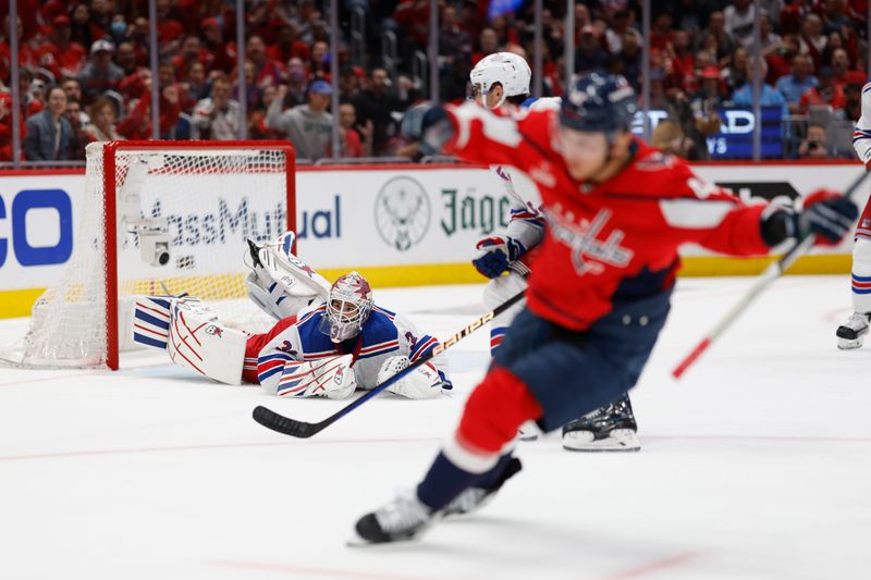 Apr 28, 2024; Washington, District of Columbia, USA; New York Rangers goaltender Igor Shesterkin (31) is beaten by a shot from Washington Capitals defenseman Martin Fehervary (42) in the first period in game four of the first round of the 2024 Stanley Cup Playoffs at Capital One Arena. Mandatory Credit: Geoff Burke-USA TODAY Sports