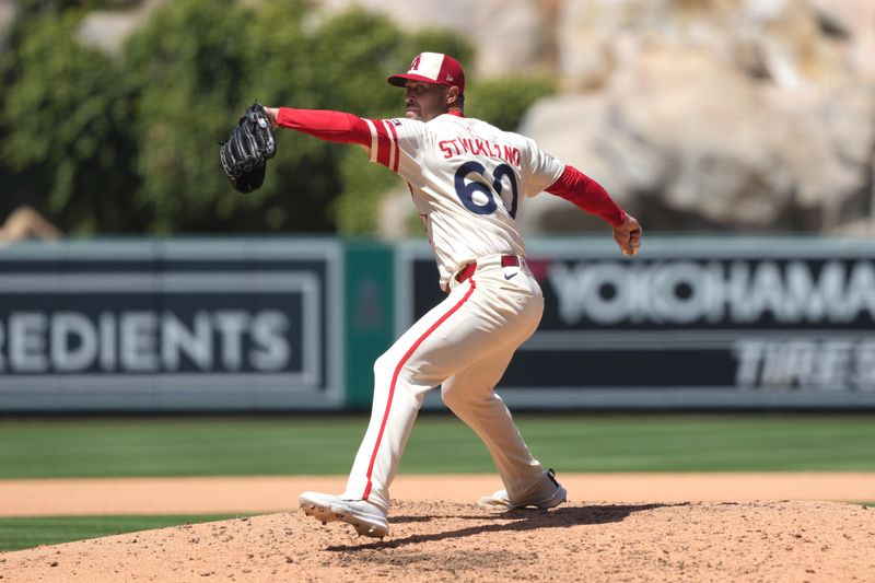 Jun 8, 2025; Anaheim, California, USA; Los Angeles Angels relief pitcher Hunter Strickland (60) throws in the fifth inning against the Seattle Mariners at Angel Stadium. Mandatory Credit: Kirby Lee-Imagn Images