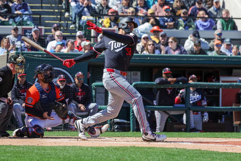 Feb 23, 2026; Lakeland, Florida, USA; Minnesota Twins right fielder Matt Wallner (38) bats during the first inning against the Detroit Tigers at Publix Field at Joker Marchant Stadium. Mandatory Credit: Mike Watters-Imagn Images