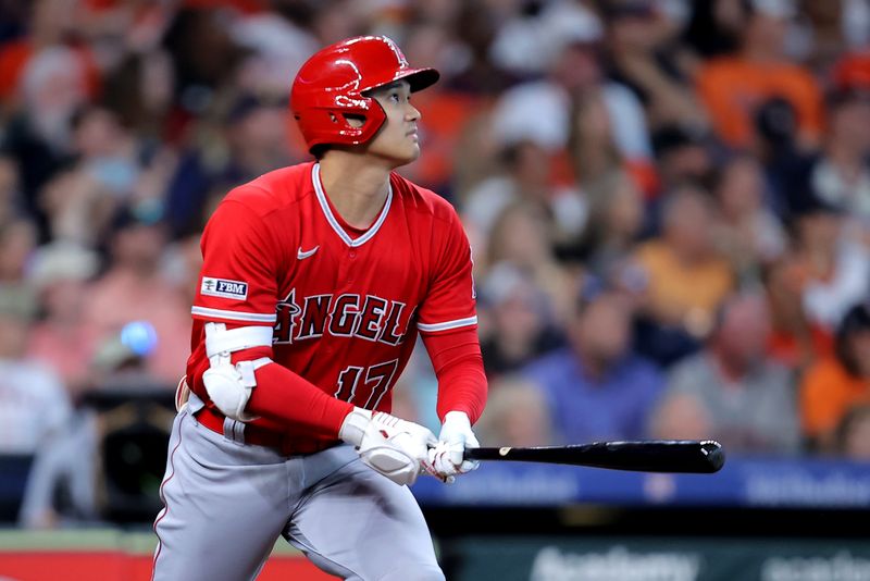 Aug 13, 2023; Houston, Texas, USA; Los Angeles Angels designated hitter Shohei Ohtani (17) hits a home run to center field against the Houston Astros during the sixth inning at Minute Maid Park. Mandatory Credit: Erik Williams-USA TODAY Sports