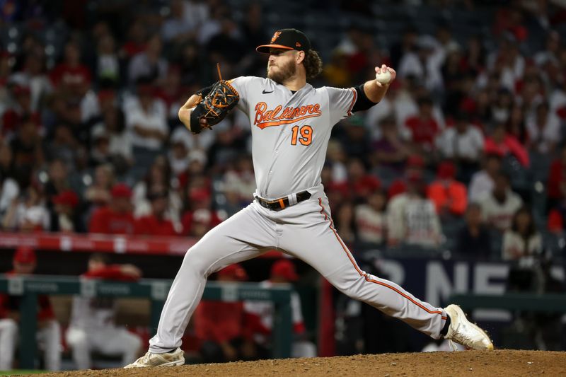 Sep 6, 2023; Anaheim, California, USA; Baltimore Orioles starting pitcher Cole Irvin (19) pitches during the ninth inning against the Los Angeles Angels at Angel Stadium. Mandatory Credit: Kiyoshi Mio-USA TODAY Sports