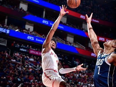 HOUSTON, TX - DECEMBER 22:   Jalen Green #4 of the Houston Rockets drives to the basket during the game against the Dallas Mavericks on December 22, 2023 at the Toyota Center in Houston, Texas. NOTE TO USER: User expressly acknowledges and agrees that, by downloading and or using this photograph, User is consenting to the terms and conditions of the Getty Images License Agreement. Mandatory Copyright Notice: Copyright 2023 NBAE (Photo by Logan Riely/NBAE via Getty Images)