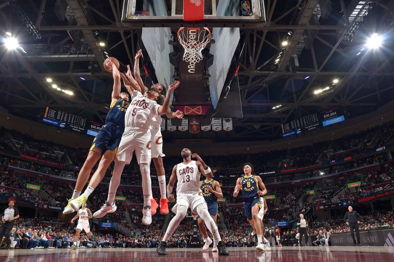 CLEVELAND, OH - APRIL 13: Johnny Furphy #12 of the Indiana Pacers drives to the basket during the game aCleveland Cavaliers on April 13, 2025 at Rocket Arena in Cleveland, Ohio. NOTE TO USER: User expressly acknowledges and agrees that, by downloading and/or using this Photograph, user is consenting to the terms and conditions of the Getty Images License Agreement. Mandatory Copyright Notice: Copyright 2025 NBAE (Photo by David Liam Kyle/NBAE via Getty Images)