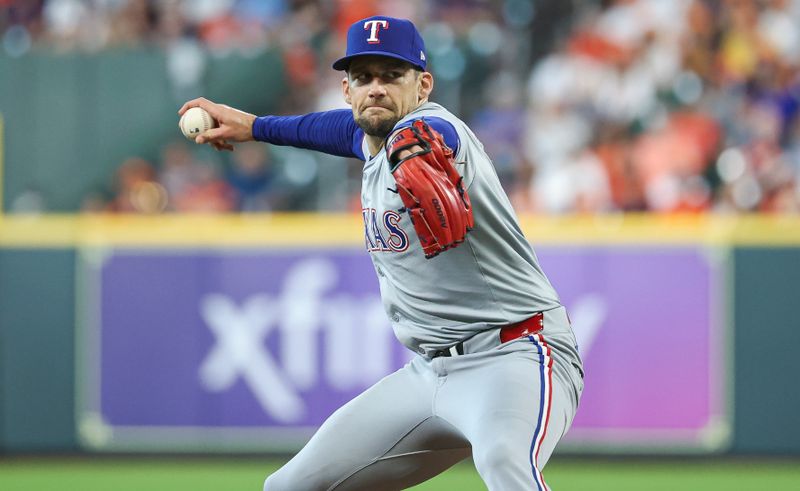 Apr 14, 2024; Houston, Texas, USA; Texas Rangers pitcher Nathan Eovaldi (17) delivers a pitch during the first inning against the Houston Astros at Minute Maid Park. Mandatory Credit: Troy Taormina-USA TODAY Sports