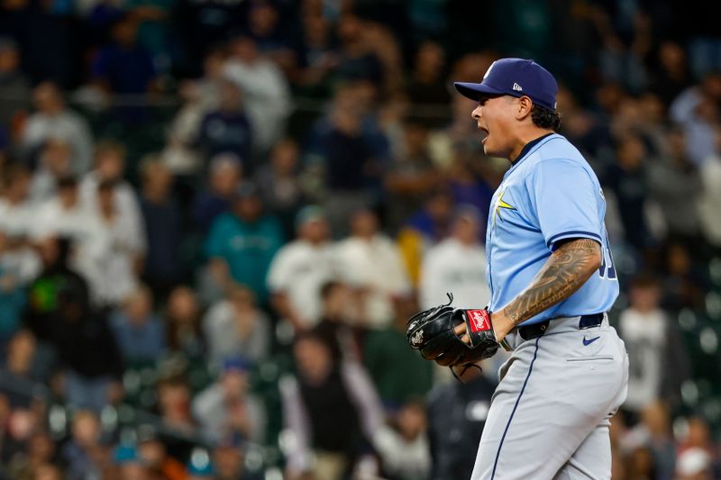 Aug 27, 2024; Seattle, Washington, USA; Tampa Bay Rays relief pitcher Manuel Rodriguez (39) reacts following the final out of the ninth inning against the Seattle Mariners at T-Mobile Park. Mandatory Credit: Joe Nicholson-USA TODAY Sports