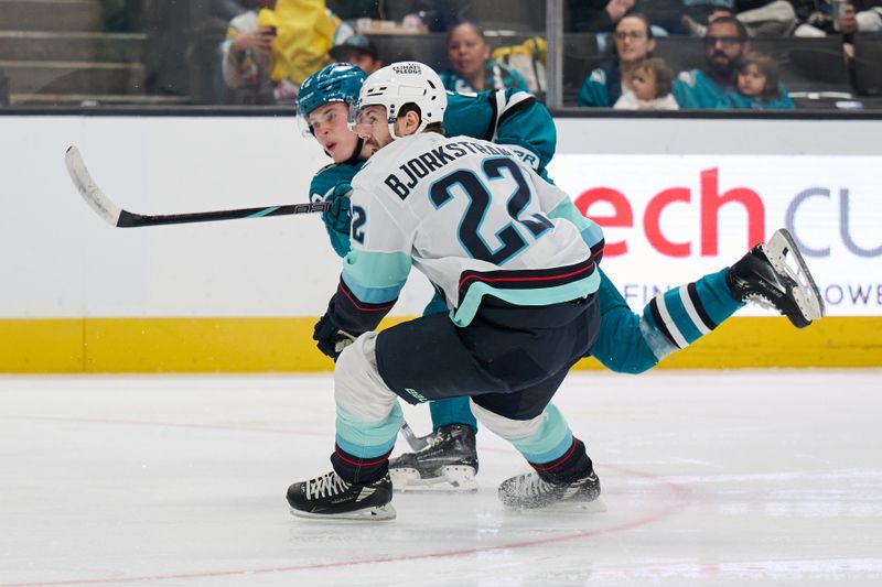 Nov 29, 2024; San Jose, California, USA; San Jose Sharks center Will Smith (2) shoots the puck and scores a goal against Seattle Kraken right wing Oliver Bjorkstrand (22) during the second period at SAP Center at San Jose. Mandatory Credit: Robert Edwards-Imagn Images