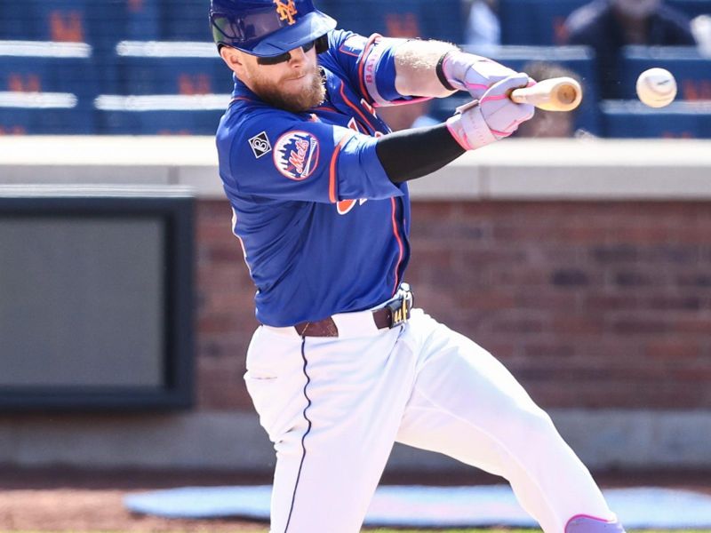May 26, 2024; New York City, New York, USA;  New York Mets center fielder Harrison Bader (44) hits a game-tying two-run double in the ninth inning against the San Francisco Giants at Citi Field. Mandatory Credit: Wendell Cruz-USA TODAY Sports