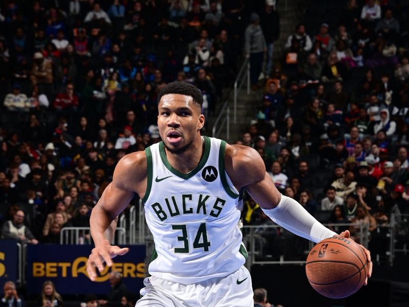 DETROIT, MI - DECEMBER 3: Giannis Antetokounmpo #34 of the Milwaukee Bucks dribbles the ball during the game against the Detroit Pistons during the Emirates NBA Cup game on December 3, 2024 at Little Caesars Arena in Detroit, Michigan. NOTE TO USER: User expressly acknowledges and agrees that, by downloading and/or using this photograph, User is consenting to the terms and conditions of the Getty Images License Agreement. Mandatory Copyright Notice: Copyright 2024 NBAE (Photo by Chris Schwegler/NBAE via Getty Images)