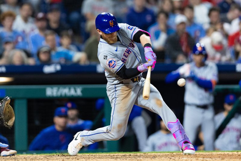 May 16, 2024; Philadelphia, Pennsylvania, USA; New York Mets outfielder Harrison Bader (44) hits a double during the eleventh inning against the Philadelphia Phillies at Citizens Bank Park. Mandatory Credit: Bill Streicher-USA TODAY Sports