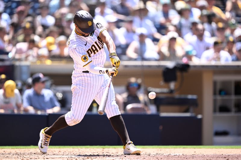 Jul 26, 2023; San Diego, California, USA; San Diego Padres shortstop Xander Bogaerts (2) hits a single against the Pittsburgh Pirates during the sixth inning at Petco Park. Mandatory Credit: Orlando Ramirez-USA TODAY Sports