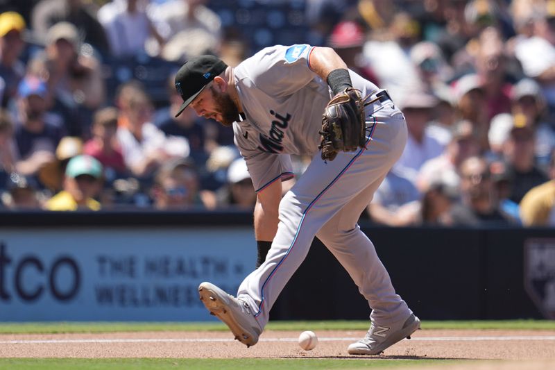 Aug 23, 2023; San Diego, California, USA;  Miami Marlins third baseman Jake Burger (36) deflects a ground ball by San Diego Padres designated hitter Manny Machado (not pictured) during the fourth inning at Petco Park. Mandatory Credit: Ray Acevedo-USA TODAY Sports